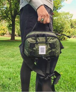 topo designs MOUNTAIN HIP PACK hold hand