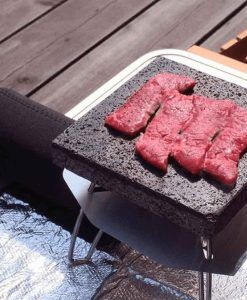 Soto ST 3102 Lava Rock Grill Plate grilling rare meat on table